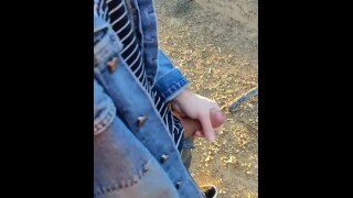 Outdoor amateur hand job with a horny young man